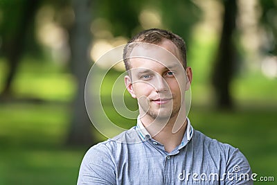 Attractive young man outdoor portrait Stock Photo