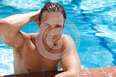 Attractive Young Man in Pool Stock Photo