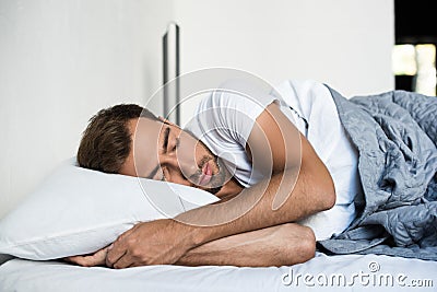 Attractive young man sleeping peacefully Stock Photo