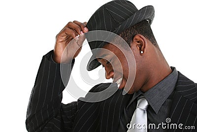 Attractive Young Man Tipping His Hat Stock Photo