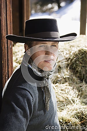 Attractive Young Man Wearing a Black Cowboy Hat Stock Photo