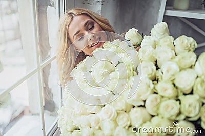 Attractive young woman at home Stock Photo