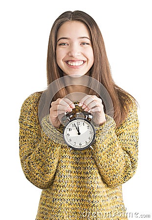 Attractive young woman holding alarm clock Stock Photo