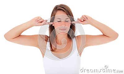 Attractive young woman keeps her ears shut Stock Photo