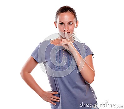 Attractive young woman requesting to you silence Stock Photo