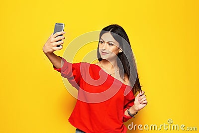 Attractive young woman taking selfie Stock Photo