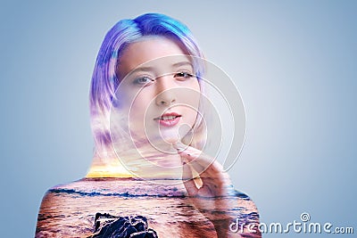 Attractive young woman touching neck while posing Stock Photo