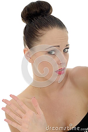 Attractive Young Woman Waving Away Someone in Bored Dispair and Stock Photo