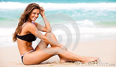 Attractive Young Woman Wearing a Black Swimsuit Stock Photo