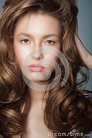 Attractiveness. Authentic Latin Woman with Perfect Curly Hairs Stock Photo
