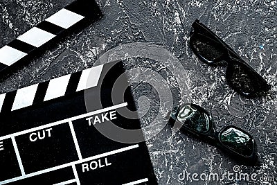 Attributes of film director. Movie clapperboard and sunglasses o Stock Photo