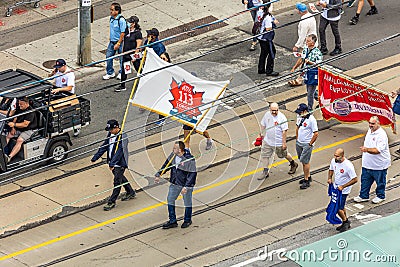 ATU Transit Union Local 113, We Move Toronto, marching in the Labour Day Parade on Queen Street West Editorial Stock Photo