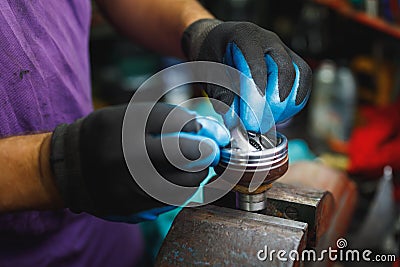 ATV constant-velocity CV joint, repair by hands Stock Photo