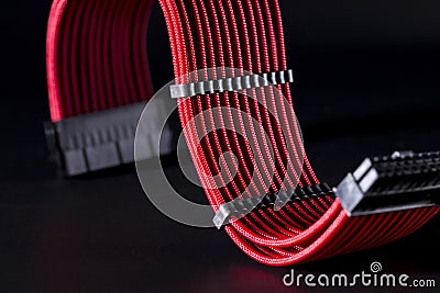 ATX cable for motherboard power on black background Stock Photo