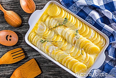 Au Gratin Dauphinois, Potatoes prepared for roasting in a pan Stock Photo