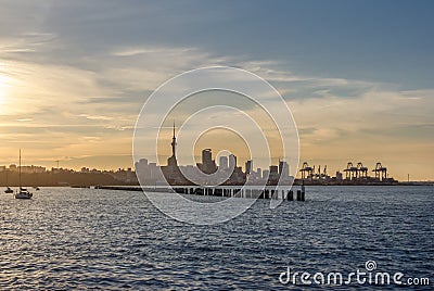 Auckland city center and its iconic skytower at sunset Stock Photo