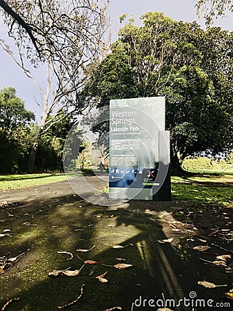 One of the entrance stand of Western Springs Lakeside Park, a man just walk in the park. Editorial Stock Photo