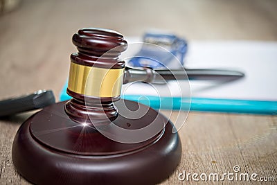 Auction hammer with golden details, a car key Stock Photo