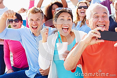 Audience Cheering At Outdoor Concert Performance Stock Photo