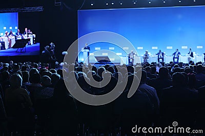 Audience at the conference hall. Speaker giving a talk on corporate Business Conference. Business and Entrepreneurship Editorial Stock Photo