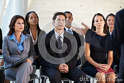 Audience Listening To Presentation At Conference Stock Photo