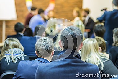 Audience Looking at the Group of Young Professional Mediators Stock Photo