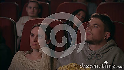 Audience Watching Film In Movie Theater Couple Watching Bored