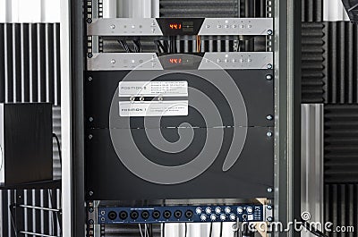 Audio converters mounted on a rack. Stock Photo