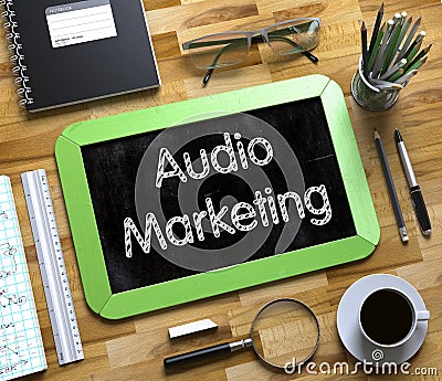 Audio Marketing Concept on Small Chalkboard. 3D. Stock Photo