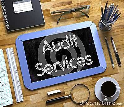 Audit Services Handwritten on Small Chalkboard. 3D. Stock Photo