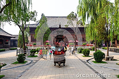 Aug 2013 - Pingyao, Shanxi, China - Tourists in the courtyard of Confucius temple in Pingyao Editorial Stock Photo