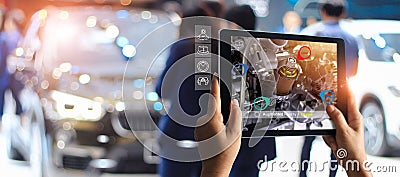 Augmented reality concept. AR. Industrial 4.0 , Hand of engineer holding tablet using virtual AR Stock Photo