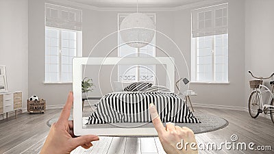 Augmented reality concept. Hand holding tablet with AR application used to simulate furniture and interior design products in real Stock Photo