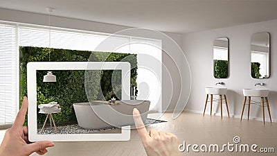 Augmented reality concept. Hand holding tablet with AR application used to simulate furniture and interior design products in real Stock Photo