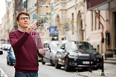 Augmented reality in marketing. Man with phone. Stock Photo