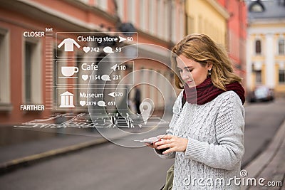 Augmented reality in marketing. Woman traveler with phone. Stock Photo