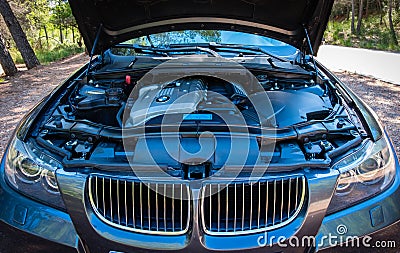 BMW 3 series E90 330i Sparkling Graphite engine view at the mountain road Editorial Stock Photo