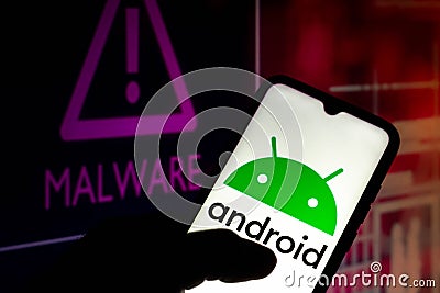 August 25, 2021, Brazil. In this photo illustration the Android logo displayed on a smartphone with malware alert in the Cartoon Illustration