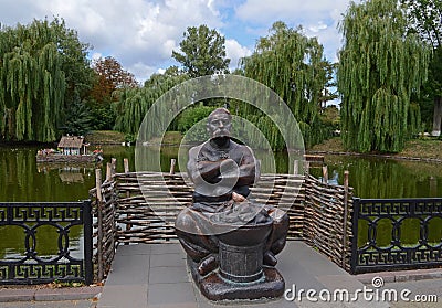 August 19, 2012 - sculptures of heroes of Gogol's works near the pond Mirgorod puddle Editorial Stock Photo