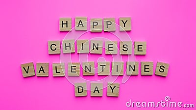 happy QiXi Festival, Double Seven Festival, Chinese Valentines Day, minimalistic banner with wooden letters Stock Photo