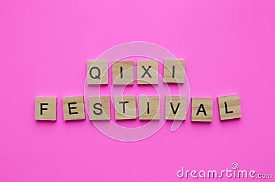 QiXi Festival, Double Seven Festival, Chinese Valentines Day, minimalistic banner with wooden letters Stock Photo