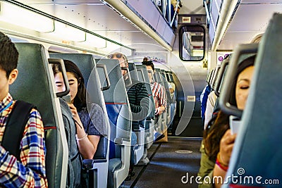 Passengers in a Caltrain Editorial Stock Photo
