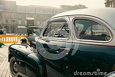 August 12, 2022, Spain A Coruna: Classic Elegance: The Chevrolet Fleetline Car at an Urban Exhibition Editorial Stock Photo