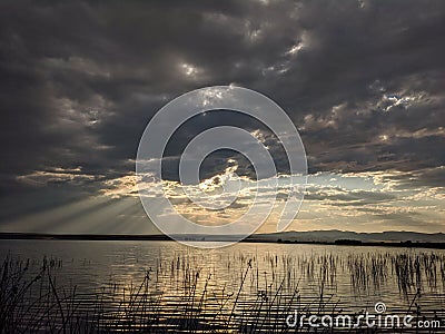 August Sumer storm with sun rays Stock Photo