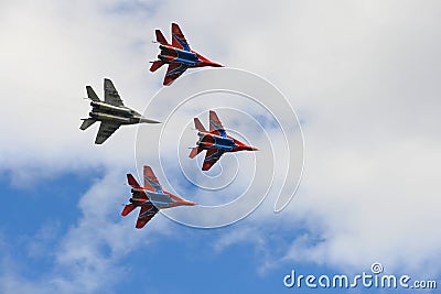August 16, 2015: Swifts Aerobatic team fly MIG-29 combat aircraft. Cheboksary. Russia Editorial Stock Photo