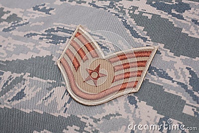 August 31, 2020. US AIR FORCE Staff Sergeant rank patch on digital tiger-stripe pattern Airman Battle Uniform Stock Photo