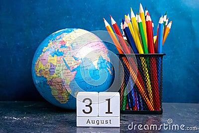August 31 on the wooden calendar.The thirtieth day of the summer month, a calendar for the workplace. Summer Stock Photo