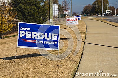 David Perdue Kelly Loeffler lawn election signs in on a lawn on Belair road Editorial Stock Photo