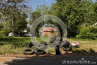 Discarded pile of car tires in a lot Editorial Stock Photo