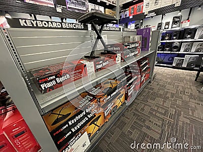 Guitar Center retail store interior piano bench display Editorial Stock Photo
